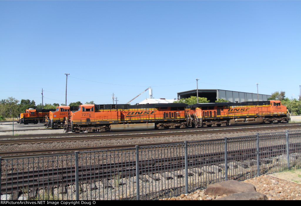 Trio of BNSF engines in Temple, Texas. Taken from depot model railroad porch.